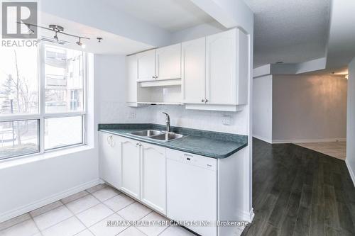 209 - 4640 Kimbermount Avenue, Mississauga, ON - Indoor Photo Showing Kitchen With Double Sink