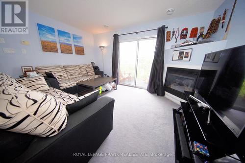 402 - 12 St Andrew Street, Norfolk (Port Dover), ON - Indoor Photo Showing Living Room With Fireplace