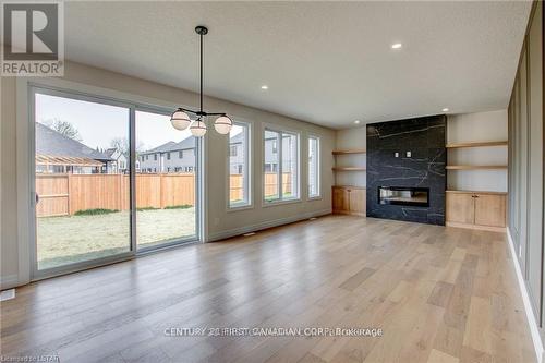 58 Aspen Circle, Thames Centre (Thorndale), ON - Indoor Photo Showing Living Room With Fireplace