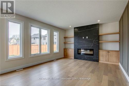 58 Aspen Circle, Thames Centre (Thorndale), ON - Indoor Photo Showing Living Room With Fireplace