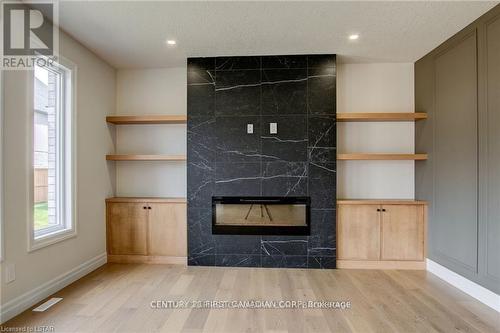 58 Aspen Circle, Thames Centre (Thorndale), ON - Indoor Photo Showing Living Room With Fireplace