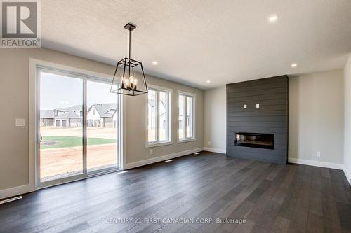 100 Aspen Circle, Thames Centre (Thorndale), ON - Indoor Photo Showing Living Room With Fireplace