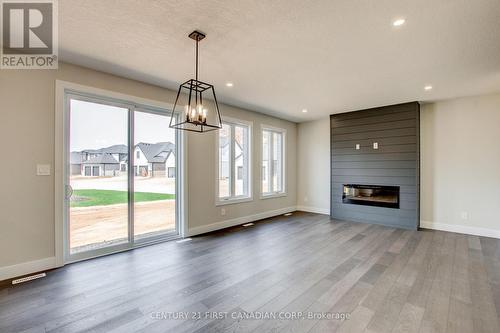 100 Aspen Circle, Thames Centre (Thorndale), ON - Indoor Photo Showing Living Room With Fireplace