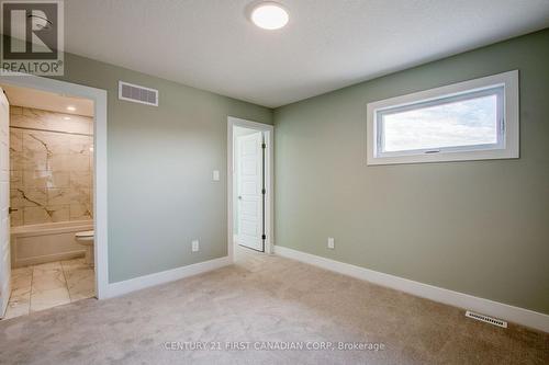 100 Aspen Circle, Thames Centre (Thorndale), ON - Indoor Photo Showing Other Room