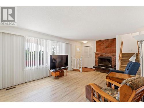2841 Lower Glenrosa Road, West Kelowna, BC - Indoor Photo Showing Living Room With Fireplace