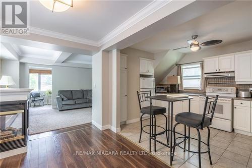 23 Hainer Street, St. Catharines, ON - Indoor Photo Showing Kitchen With Fireplace