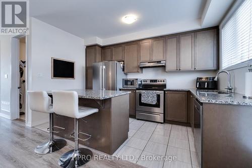 14 - 3256 Charles Fay Pass, Oakville, ON - Indoor Photo Showing Kitchen With Stainless Steel Kitchen With Double Sink