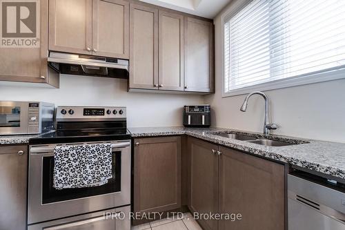 14 - 3256 Charles Fay Pass, Oakville, ON - Indoor Photo Showing Kitchen With Stainless Steel Kitchen With Double Sink