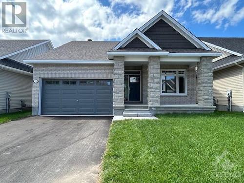 very spacious Quail 11 bungalow from Tamarack Homes with finished walkout lower level. - 755 Keinouche Place, Ottawa, ON - Outdoor With Facade