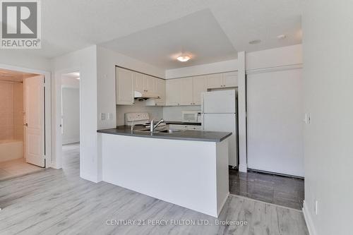 302 - 60 Brian Harrison Way, Toronto E09, ON - Indoor Photo Showing Kitchen With Double Sink