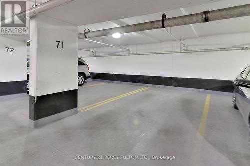 302 - 60 Brian Harrison Way, Toronto E09, ON - Indoor Photo Showing Garage