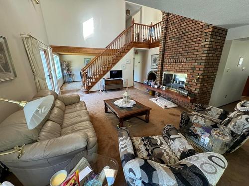 8609 Merritt Spences Br Hwy, Merritt, BC - Indoor Photo Showing Living Room With Fireplace