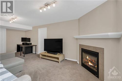 108 Eye Bright Crescent, Ottawa, ON - Indoor Photo Showing Living Room With Fireplace