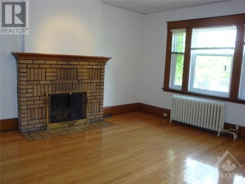 205 Glebe Avenue, Ottawa, ON - Indoor Photo Showing Living Room With Fireplace