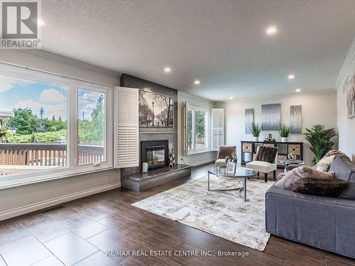 1499 Stoneybrook Trail, Oakville (Glen Abbey), ON - Indoor Photo Showing Living Room With Fireplace