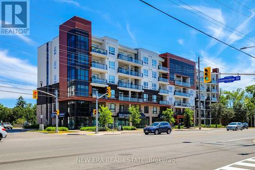 212 - 320 Plains Road E, Burlington (Lasalle), ON - Outdoor With Balcony With Facade