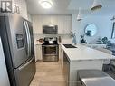 21 - 115 Longbranch Avenue, Toronto, ON  - Indoor Photo Showing Kitchen With Double Sink With Upgraded Kitchen 