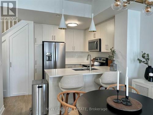 21 - 115 Longbranch Avenue, Toronto, ON - Indoor Photo Showing Kitchen With Double Sink