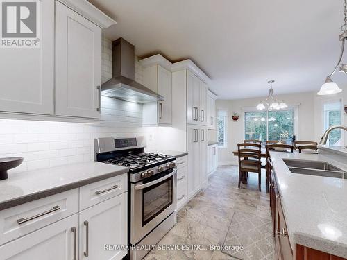 10 Bush Crescent, Wasaga Beach, ON - Indoor Photo Showing Kitchen With Double Sink With Upgraded Kitchen