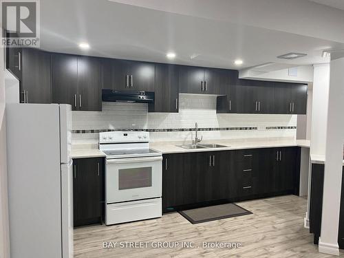 Lower - 80 Geddington Crescent, Markham (Box Grove), ON - Indoor Photo Showing Kitchen With Double Sink