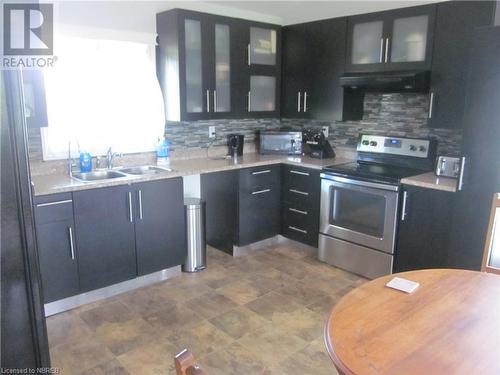 2131 Papineau Road, Mattawa, ON - Indoor Photo Showing Kitchen With Double Sink