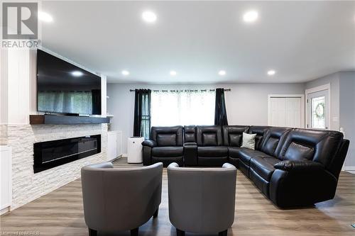 303 Corkery Street, Trout Creek, ON - Indoor Photo Showing Living Room With Fireplace