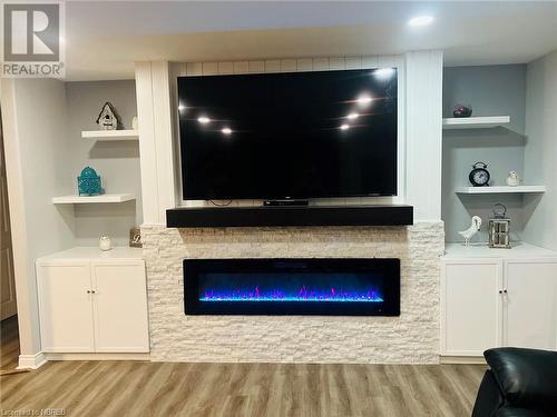 303 Corkery Street, Trout Creek, ON - Indoor Photo Showing Other Room With Fireplace