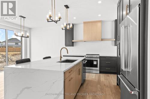 3873 Campbell Street N, London, ON - Indoor Photo Showing Kitchen With Stainless Steel Kitchen With Double Sink With Upgraded Kitchen