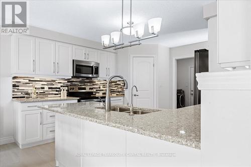 269 Woodway Trail, Norfolk (Simcoe), ON - Indoor Photo Showing Kitchen With Double Sink With Upgraded Kitchen