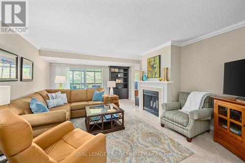 406 - 693 Windermere Road, London, ON - Indoor Photo Showing Living Room With Fireplace