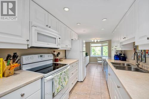 406 - 693 Windermere Road, London, ON - Indoor Photo Showing Kitchen With Double Sink