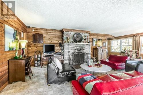 0 Nepahwin Island, Greater Sudbury, ON - Indoor Photo Showing Living Room With Fireplace