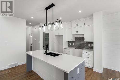 705 Sarazen Drive, Warman, SK - Indoor Photo Showing Kitchen With Double Sink With Upgraded Kitchen