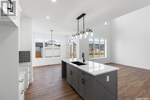 705 Sarazen Drive, Warman, SK - Indoor Photo Showing Kitchen With Double Sink