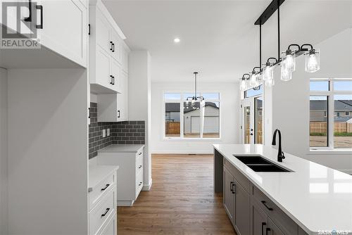 705 Sarazen Drive, Warman, SK - Indoor Photo Showing Kitchen With Double Sink