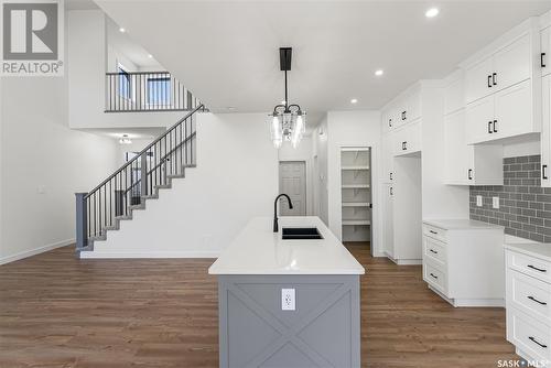 705 Sarazen Drive, Warman, SK - Indoor Photo Showing Kitchen With Double Sink With Upgraded Kitchen