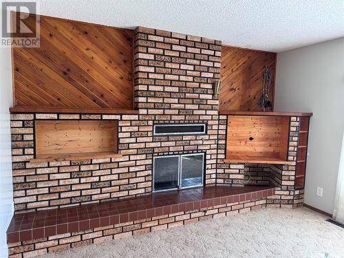 42 Shannon Street, Lanigan, SK - Indoor With Fireplace