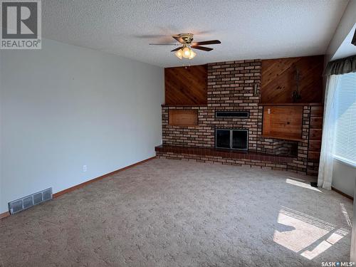 42 Shannon Street, Lanigan, SK - Indoor With Fireplace