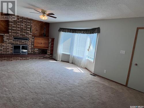 42 Shannon Street, Lanigan, SK - Indoor With Fireplace