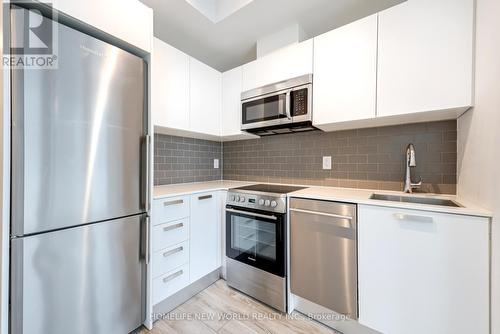 703 - 42 Charles Street E, Toronto C08, ON - Indoor Photo Showing Kitchen With Double Sink With Upgraded Kitchen