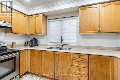 58 Leagate Street, Brampton (Fletcher'S Meadow), ON - Indoor Photo Showing Kitchen With Double Sink