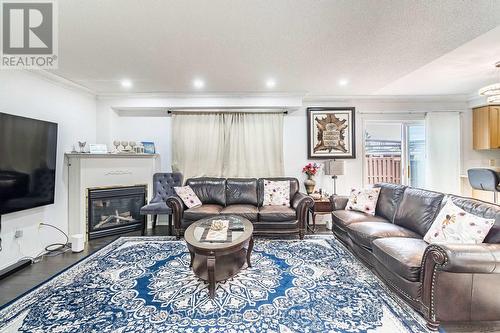 58 Leagate Street, Brampton (Fletcher'S Meadow), ON - Indoor Photo Showing Living Room With Fireplace