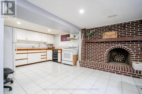5 Goldsboro Road, Toronto, ON - Indoor Photo Showing Kitchen With Fireplace
