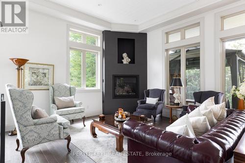 41 Clubhouse Drive, Huntsville, ON - Indoor Photo Showing Living Room With Fireplace