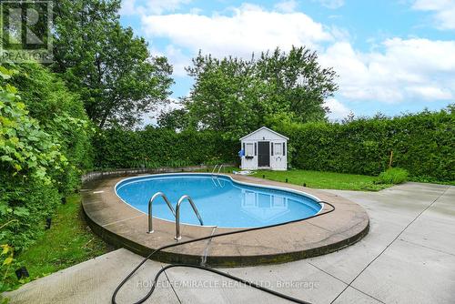 47 Greenbriar Road, Brampton, ON - Outdoor With In Ground Pool