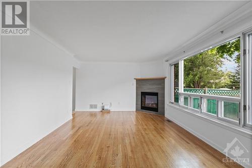 950 Woodroffe Avenue, Ottawa, ON - Indoor Photo Showing Other Room With Fireplace