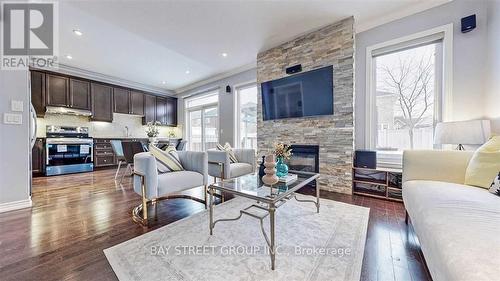 557 Woodspring Avenue, Newmarket (Woodland Hill), ON - Indoor Photo Showing Living Room With Fireplace