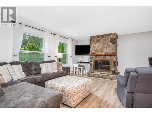 4110 Highland Park Drive, Armstrong, BC - Indoor Photo Showing Living Room With Fireplace