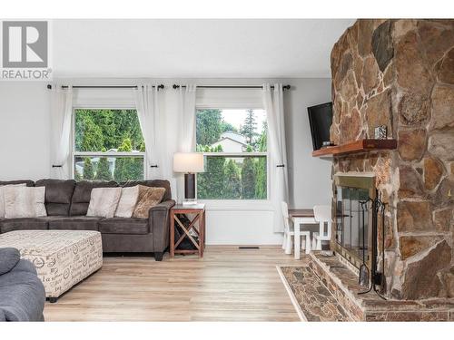 4110 Highland Park Drive, Armstrong, BC - Indoor Photo Showing Living Room With Fireplace