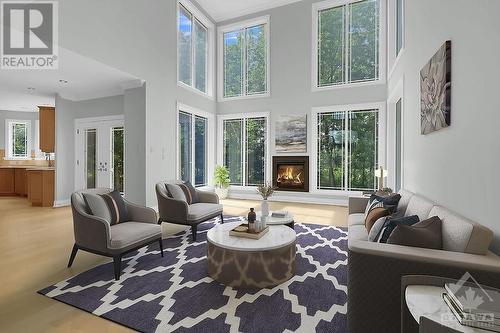 1085 Tomkins Farm Crescent, Ottawa, ON - Indoor Photo Showing Living Room With Fireplace